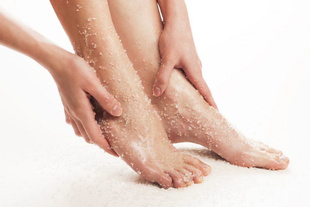 Feet treatment, exfoliation, scrub on feet