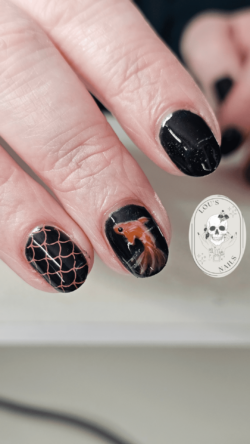 Hand painted Carp created by Louise Beattie, Done in honour of her Dad for his funeral . Styled in Flat nail art representing Nature / Scenery. These Short - Round shaped nails are crafted using the Gel Polish system and are coloured Orange.
