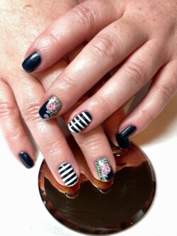 Hand Painted Nail Stamping created by Holly Schippers, Reverse painting nail stamps to give the illusion of a decal. Styled in Stamping nail art representing Floral. These Short - Squoval shaped nails are crafted using the Gel Polish system and are coloured Blue.