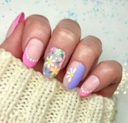 Summer Florals created by Bekki Woolnough, Hand painted florals using art gels and acrylic on soft gel tips. Styled in Embossing nail art representing Seasonal. These Medium - Round shaped nails are crafted using the Gel system and are coloured Pink.
