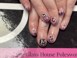 Witchy Vibes created by Louise Beattie, Short and sweet . Styled in Flat nail art representing Fairy Tale / Fantasy. These Short - Oval shaped nails are crafted using the Gel Polish system and are coloured Purple.