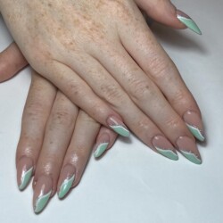 Green French  created by Natalie Morris.Styled in French nail art representing Curls &amp; Swirls. These Long - Stiletto shaped nails are crafted using the Full On Tips  system and are coloured Green. 