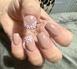 Nude flower dot acrylic nails