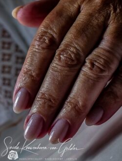 Natural nail treatment with hardgel Natural nail treatment with hardgel